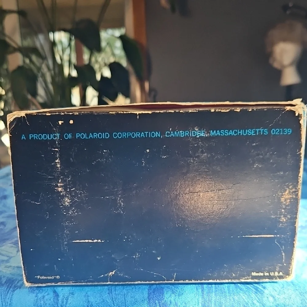 Polaroid Box with Navy Blue and Yellow Lettering
